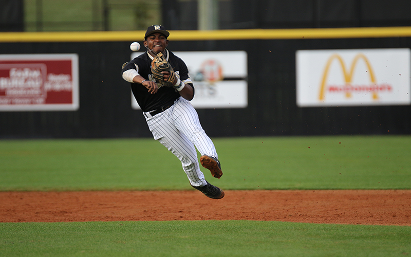 East Central freshman shortstop Amani Larry throws out a runner in game one action against Shelton State. (EC Photo)