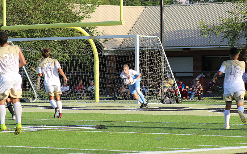 Visiting Holmes Takes Soccer Win over Warriors